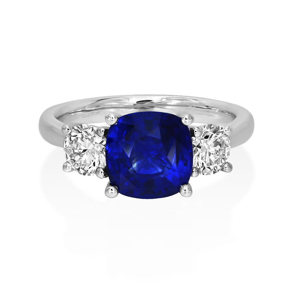 A Platinum Sapphire And Diamond Three-Stone Ring