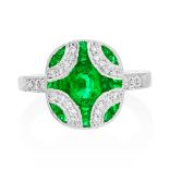 A Platinum Emerald and Diamond Ring