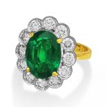 An 18ct Yellow And White Gold, Emerald And Diamond Ring