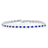 An 18ct White Gold Sapphire and Diamond Line Bracelet