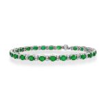 An 18ct White Gold Emerald and Diamond Line Bracelet