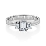 An 18ct White Gold And Diamond Three-Stone Ring