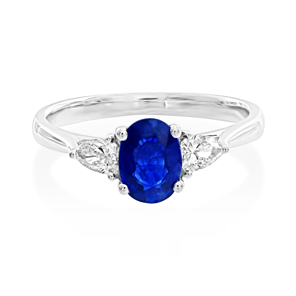 A Platinum Sapphire and Diamond Three-Stone Ring