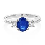 An 18ct White Gold Sapphire and Diamond Three-Stone Ring