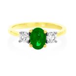 An 18ct Yellow Gold Emerald and Diamond Three-Stone Ring