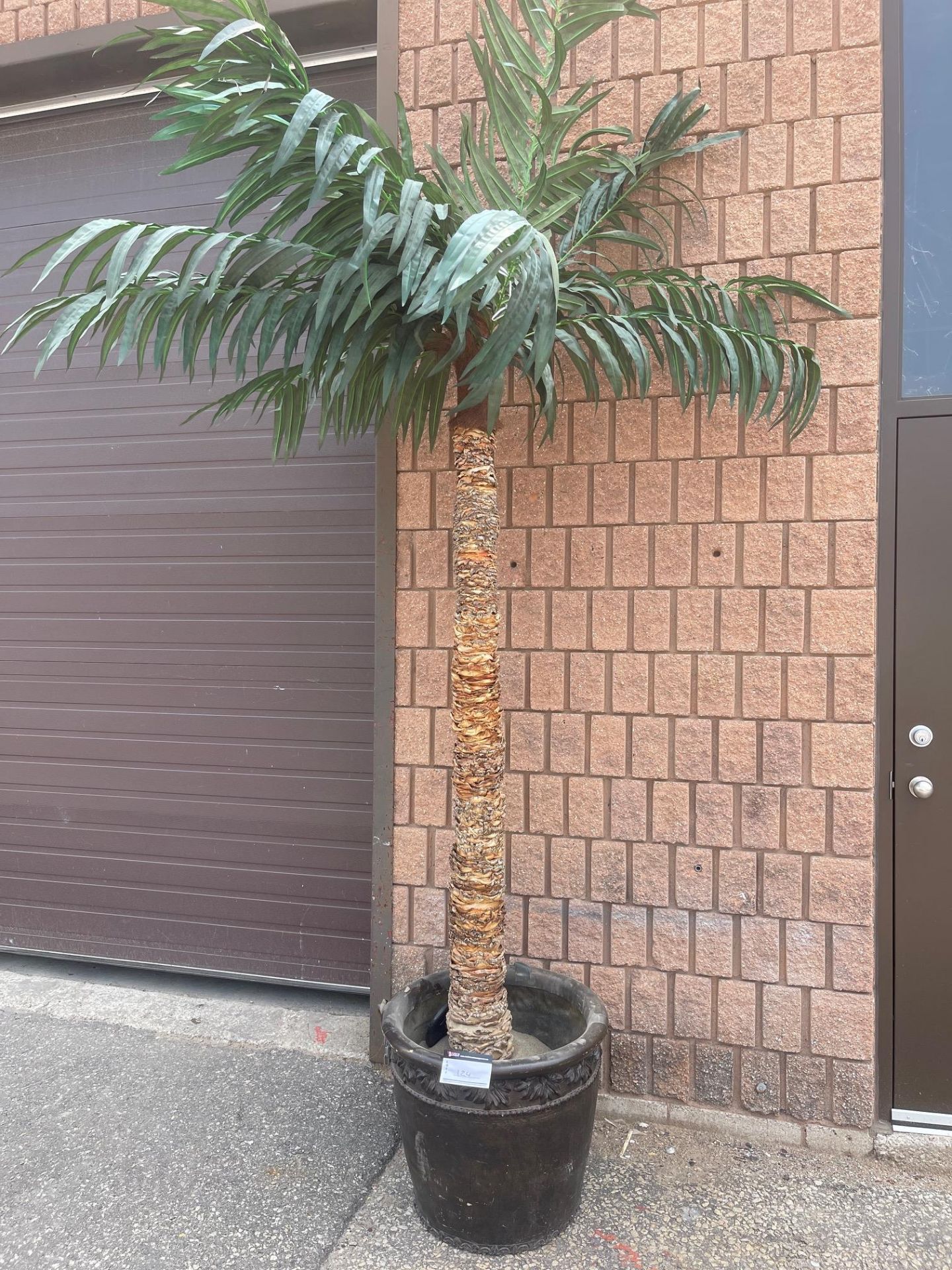 ARTIFICIAL PALM TREE, TREE BARK 84” HEIGHT WITH THE LEAVES 132” COMES WITH LARGE FLOWER POT
