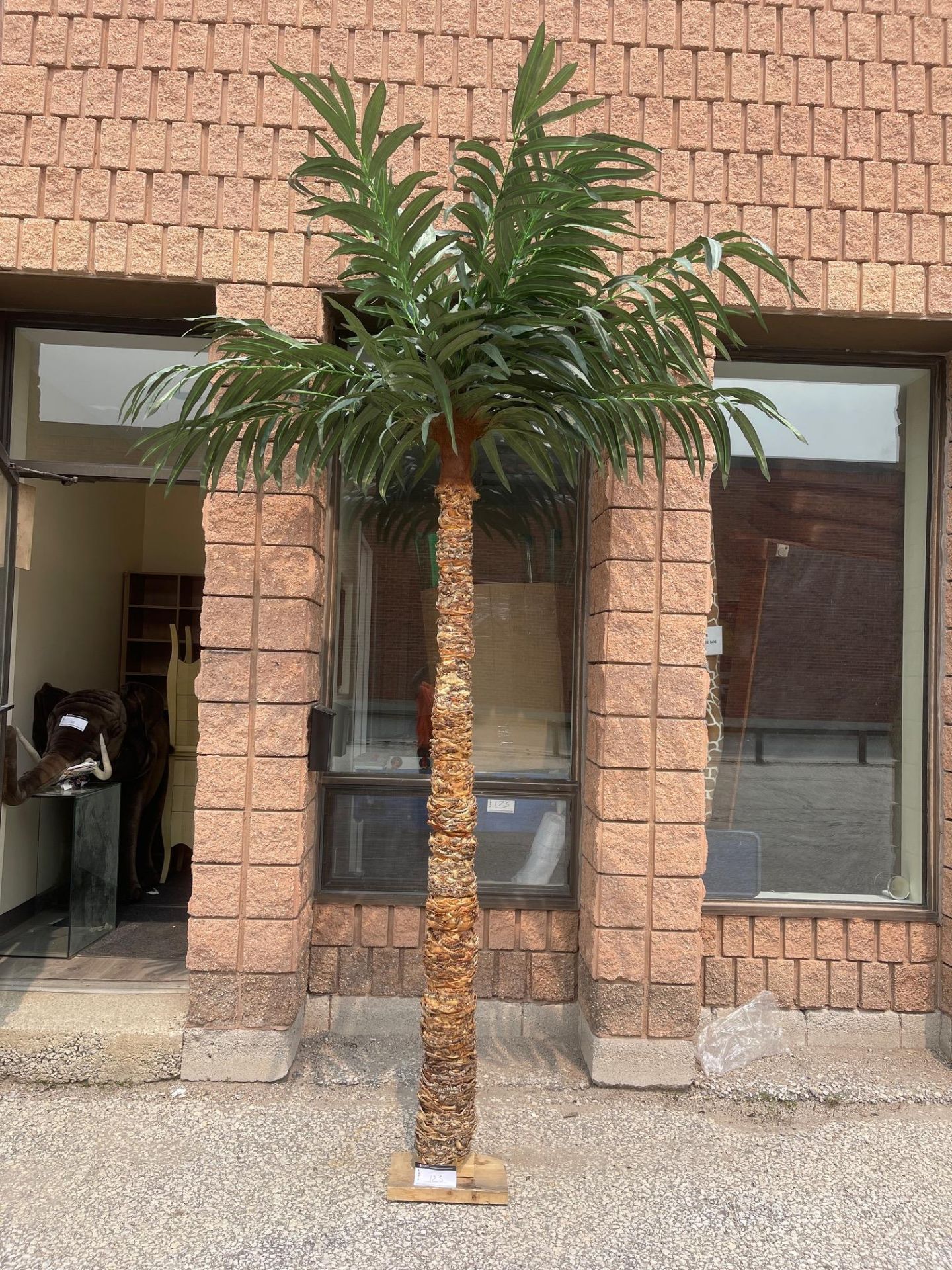 ARTIFICIAL PALM TREE, TREE BARK 84” HEIGHT WITH THE LEAVES 132” COMES WITH LARGE FLOWER POT - Image 5 of 7