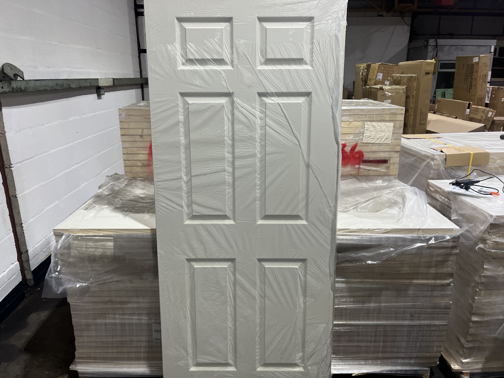 PALLET TO CONTAIN 25 X BRAND NEW PREMDOR 6 PANEL TEXTURED WHITE DOORS 78 X 34 X 1.5 INCHES