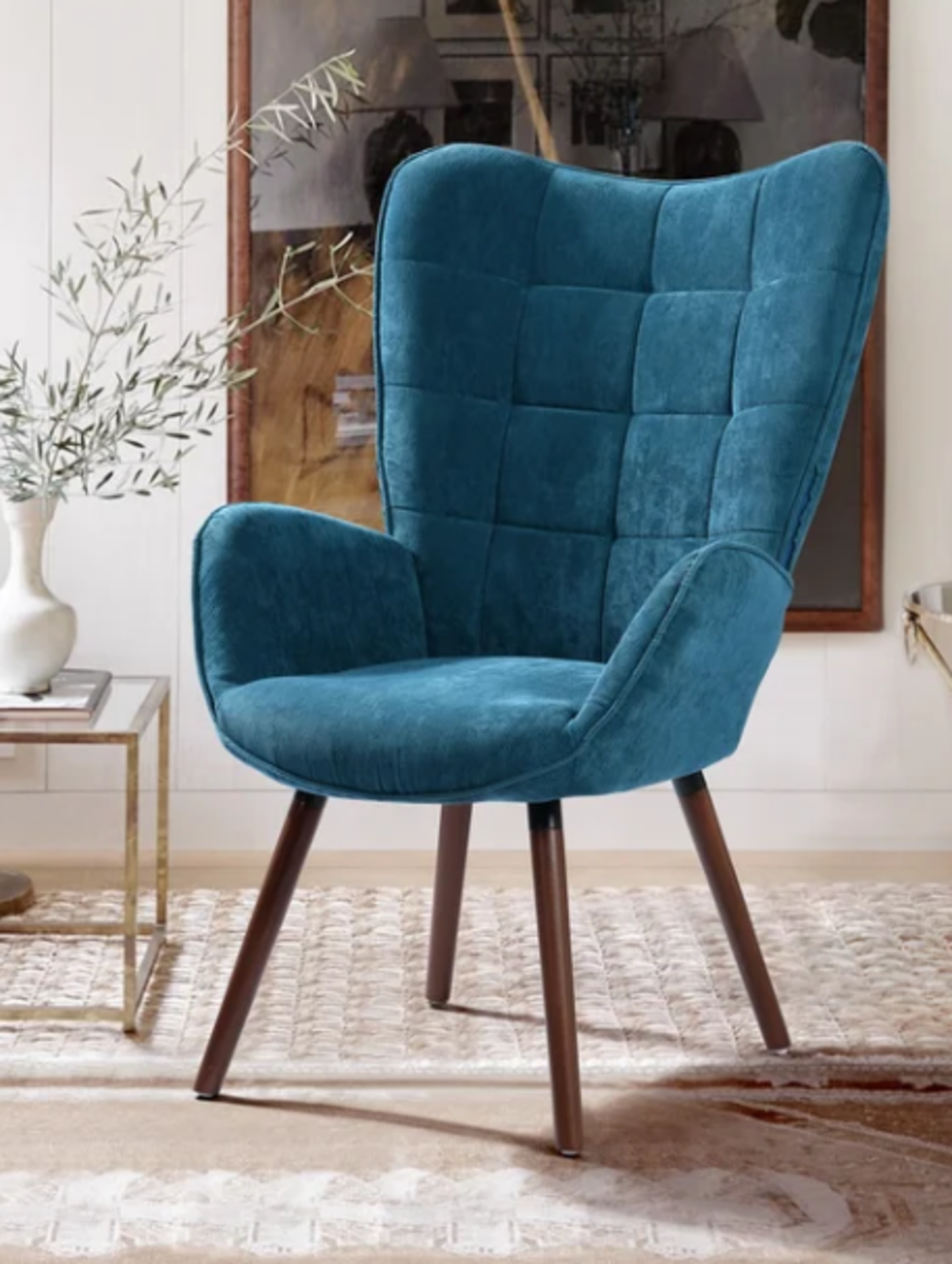 Abel Upholstered Armchair. The corduroy upholstery adds warmth and texture to a room while also