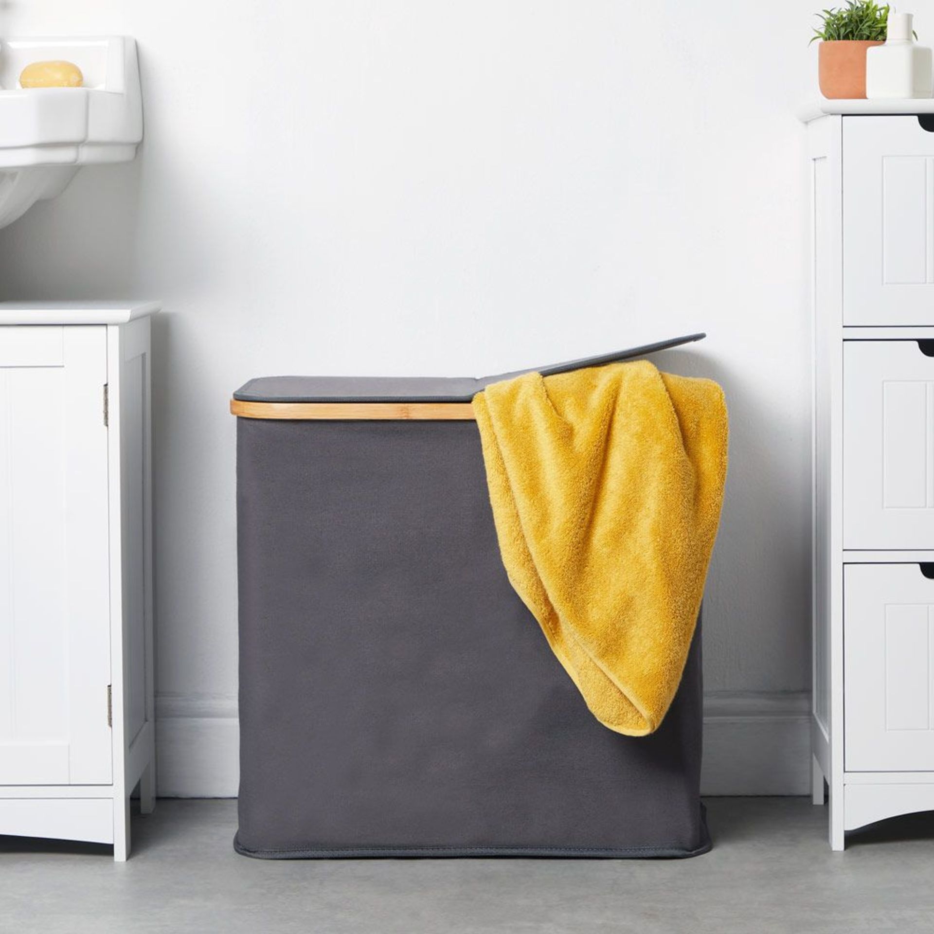 2 Compartment Laundry Basket. Add a little luxury to your laundry and house in this on-trend laundry