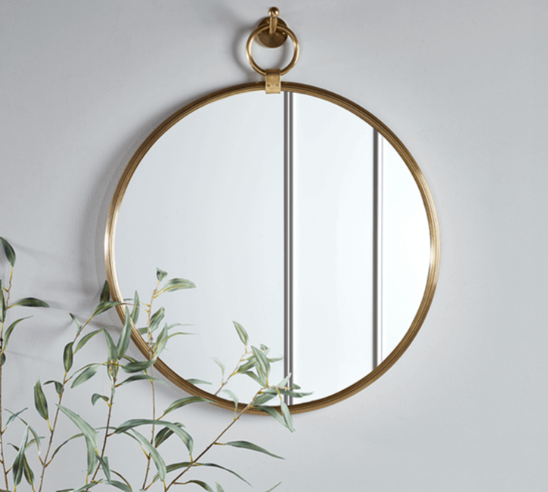 Cox & Cox Aura Brass Mirror. RRP £250.00. Crafted in a simple, circular shape with a wide mirrored