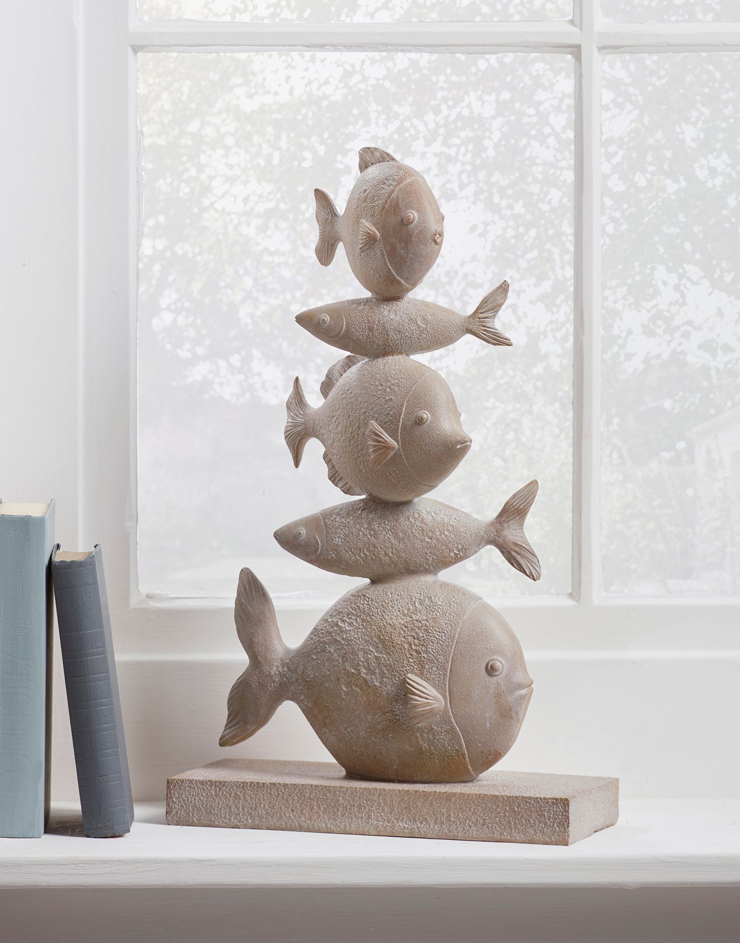 Cox & Cox Fish Totem Ornament. RRP £50.00. The brown washed finish of this lively fish ornament