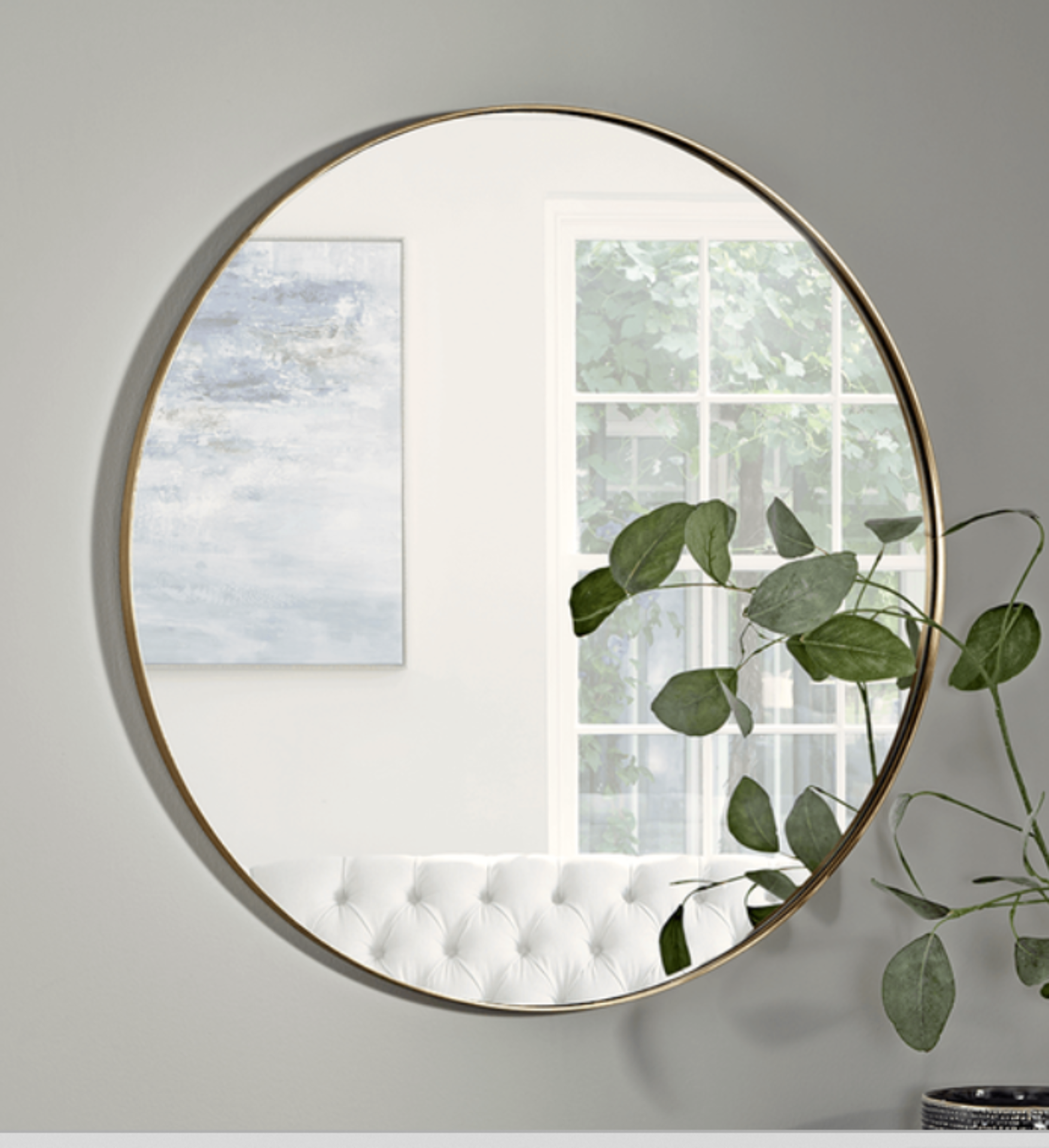 Antique Brass Slim Frame Round Mirror. RRP £195.00. Simple and contemporary, our elegant round