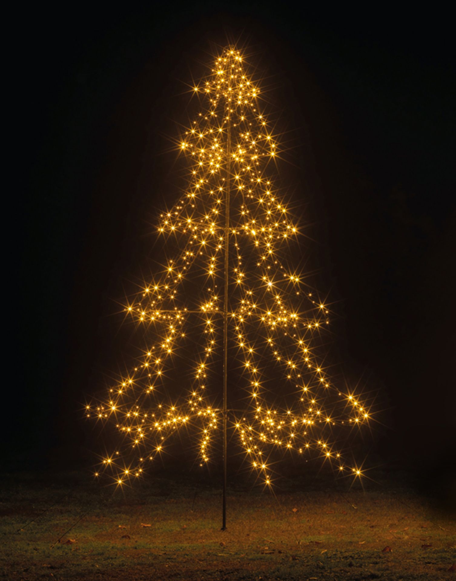Indoor Outdoor Light Up Tree. Magical and majestic, festive Indoor Outdoor Light Up Tree has a black
