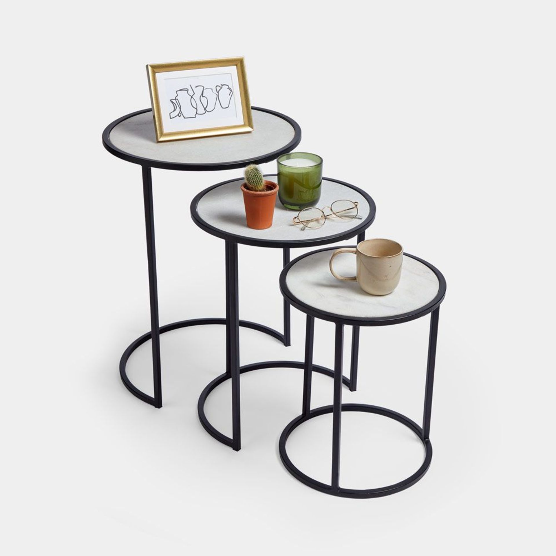 Halmore Set of 3 Marble Side Tables. - BI. With modern black iron legs holding a luxurious marble