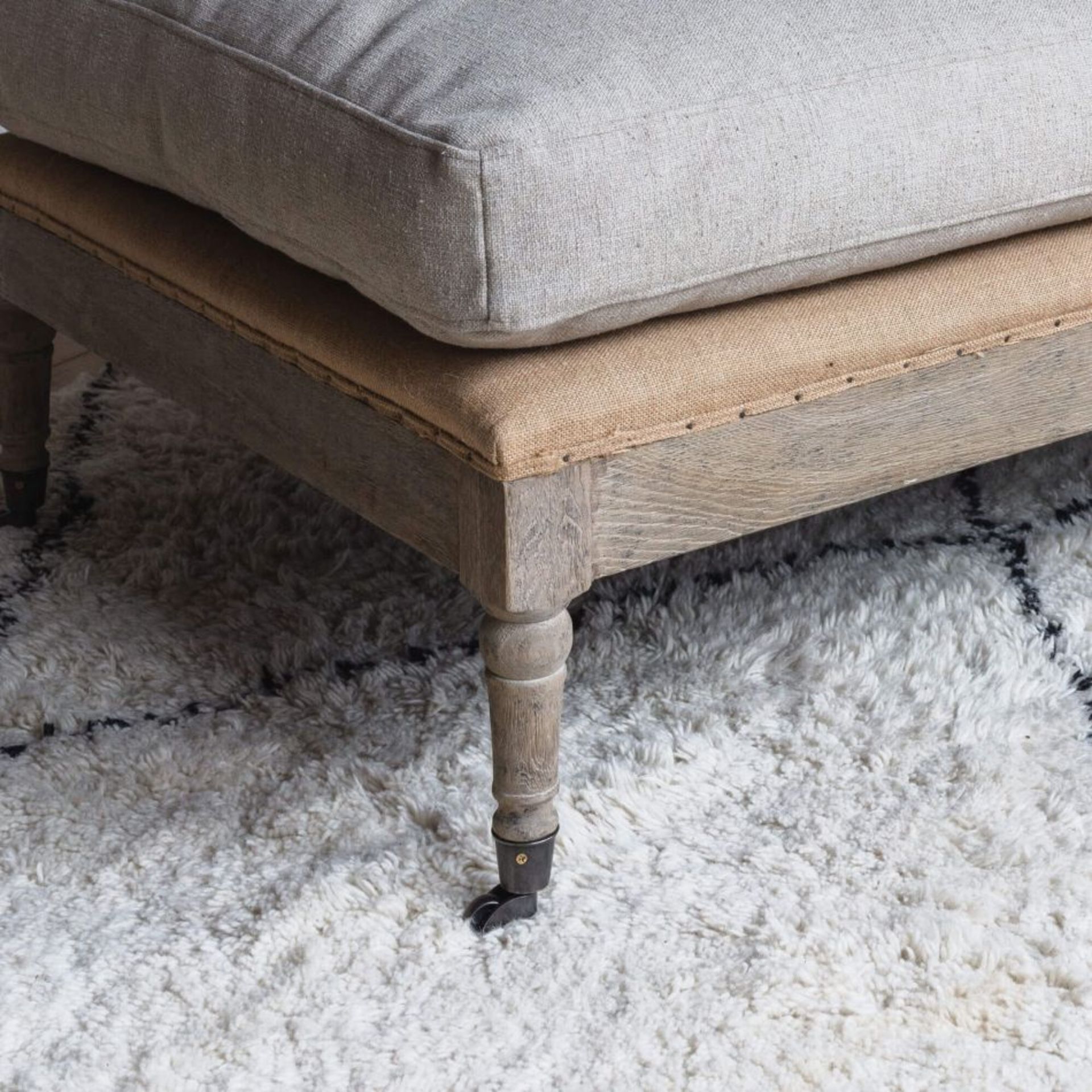 DUKE NATURAL LINEN OTTOMAN. RRP £745.00 - SR5. A long rectangular ottoman with carved oak wooden - Image 2 of 2