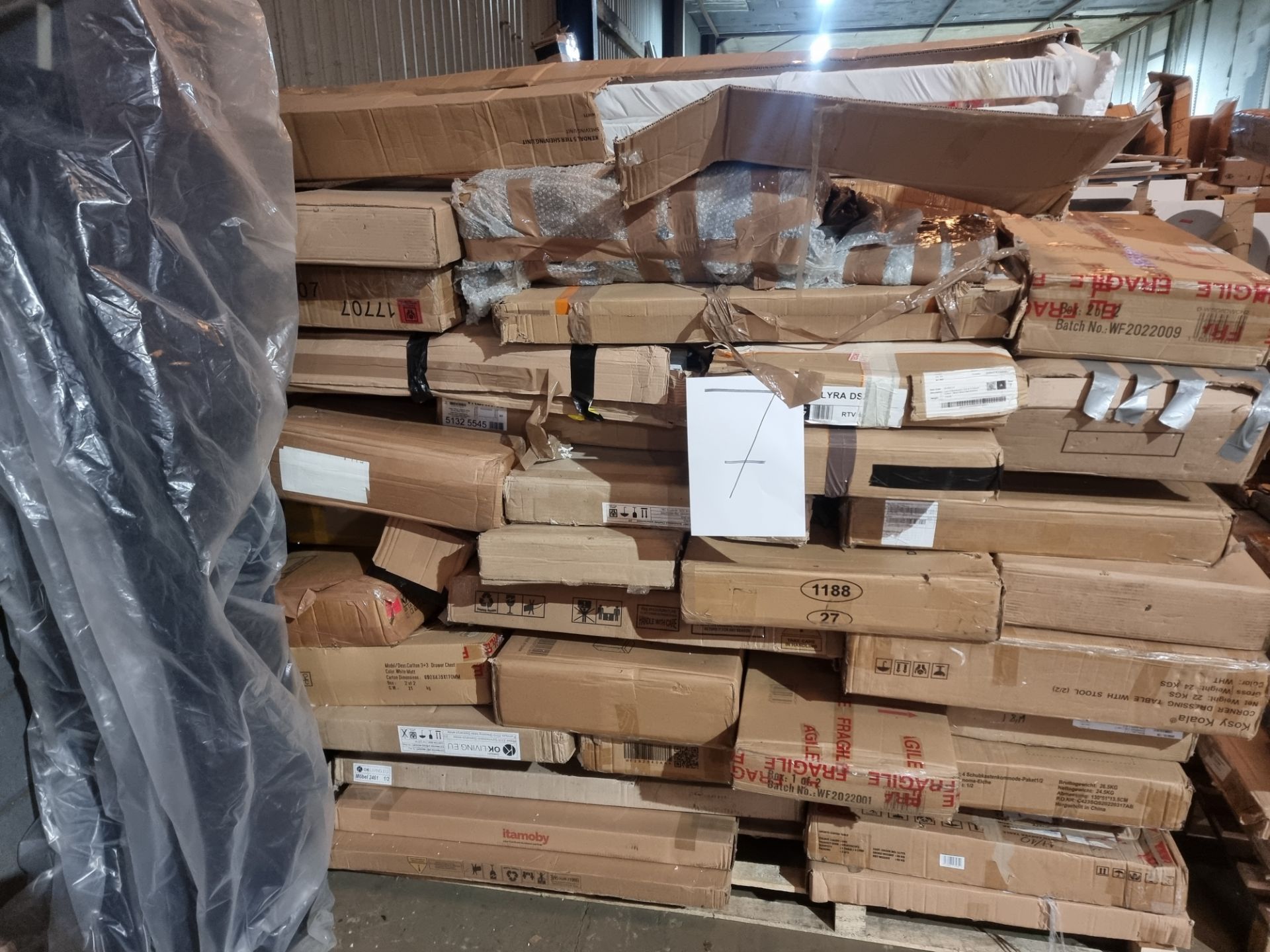 large wayfair pallet containing a large number of cabinets, tables, TV units and drawes