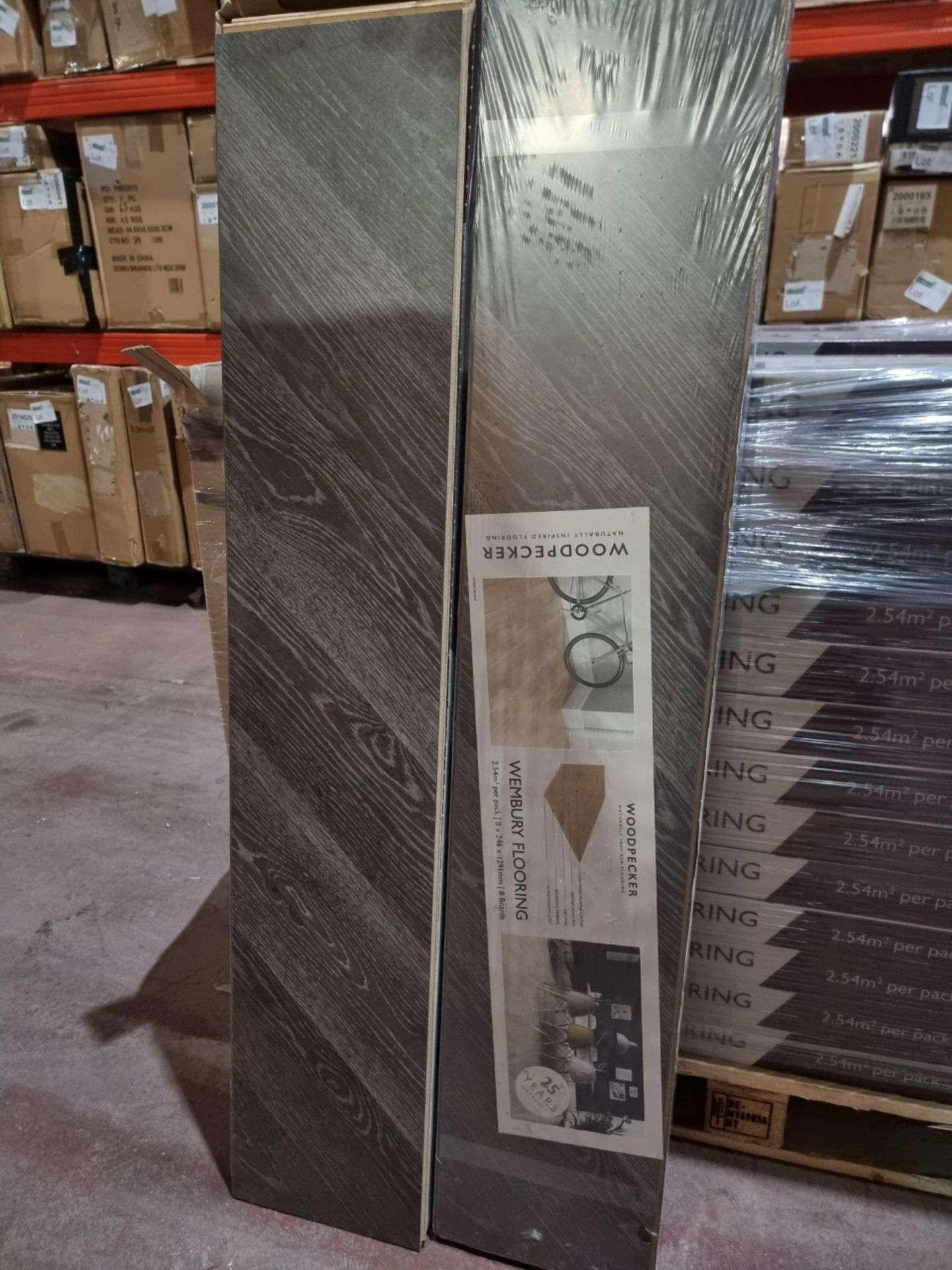 10 X NEW PACKS OF WEMBURY DUSTY OAK. LAMINATE FLOORING. 8MM. EACH PACK CONTAINS 2.54m2, GIVING
