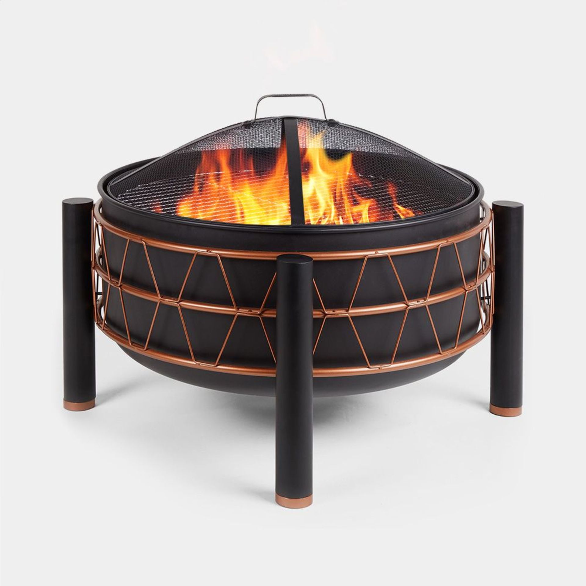 Black & Copper Fire Pit. - BI. Introduce this solid steel fire pit to your garden and start