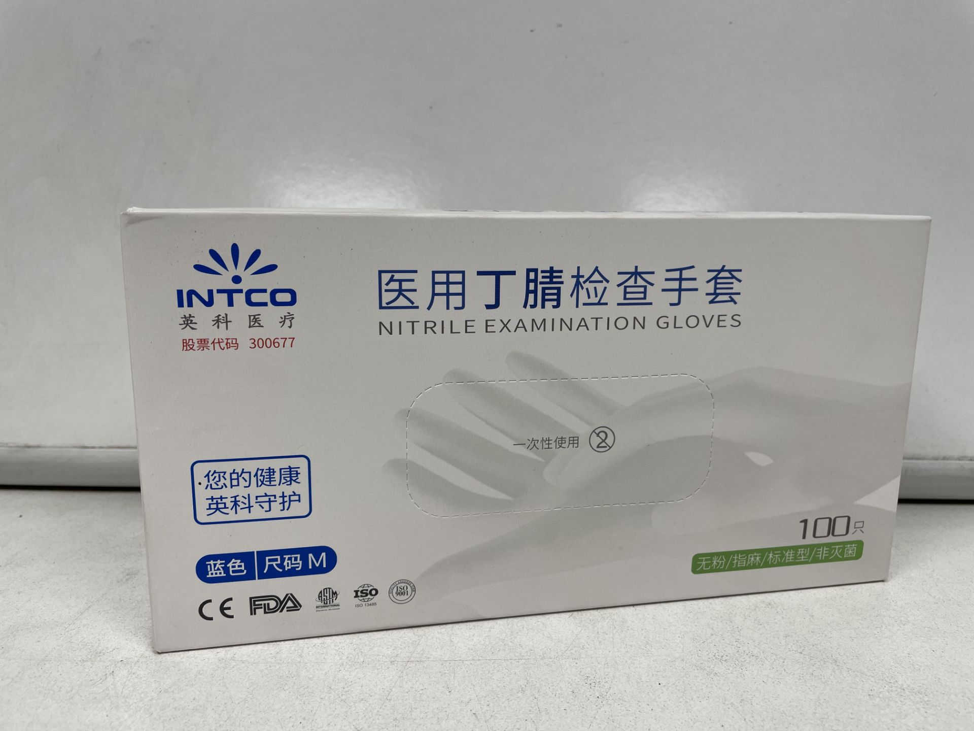 TRADE LOT 120 X NEW BOXES OF 100 INTCO NITRILE EXAMINATION GLOVES. SIZE MEDIUM. (ROW10.6)