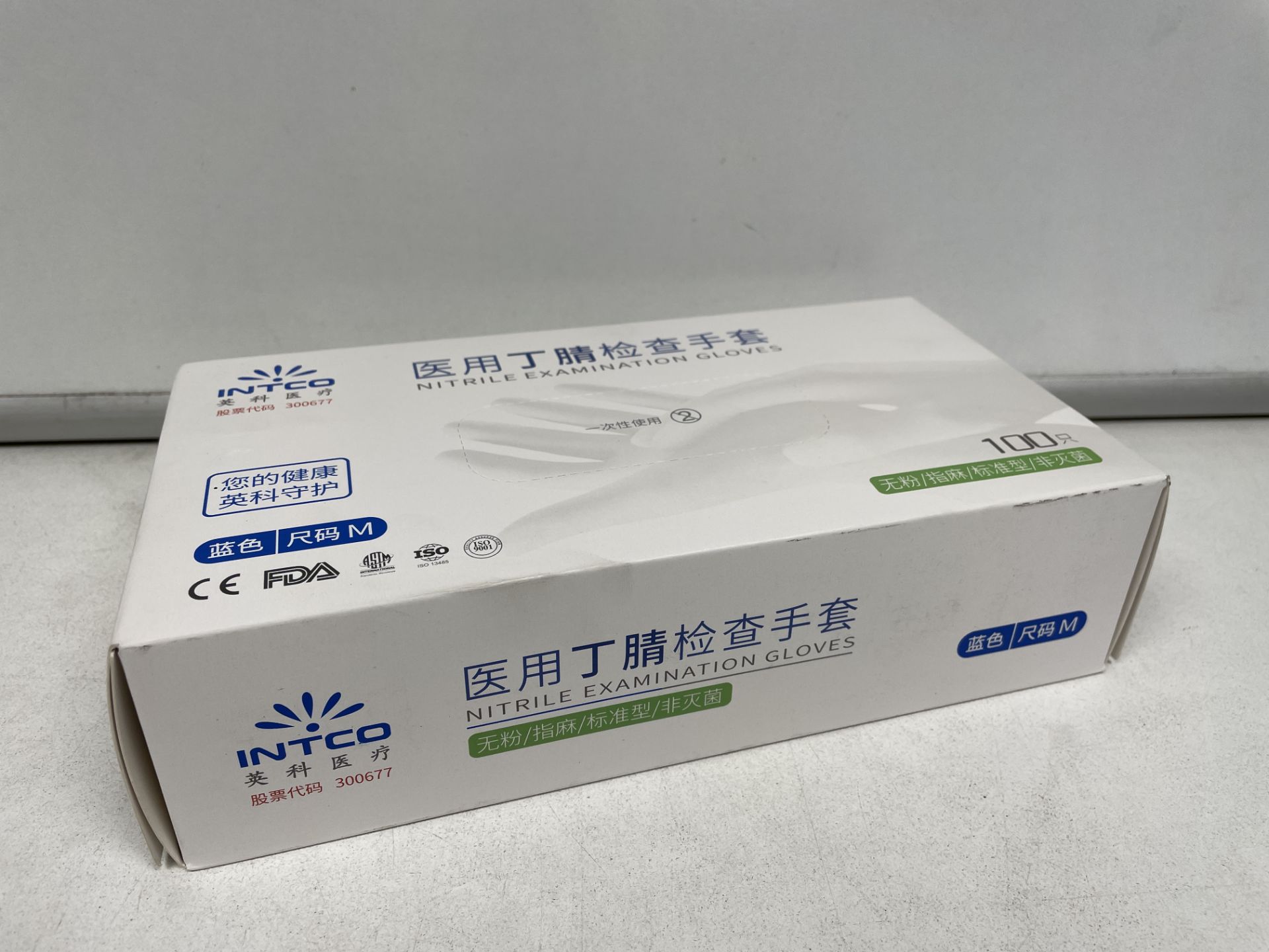 TRADE LOT 120 X NEW BOXES OF 100 INTCO NITRILE EXAMINATION GLOVES. SIZE MEDIUM. (ROW10.6) - Image 2 of 3