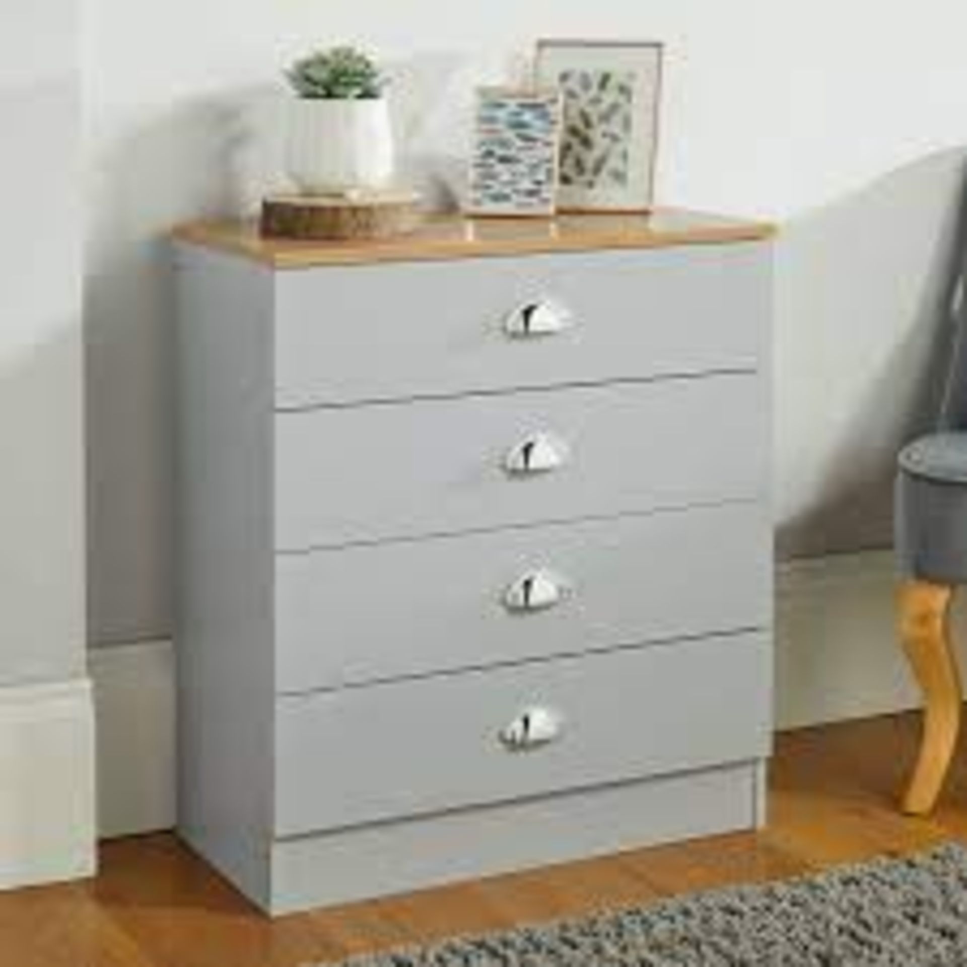 Lilsbury Grey 4 Drawer Bedroom Chest of Drawers. - BI. Boasting a classic design, the stylish