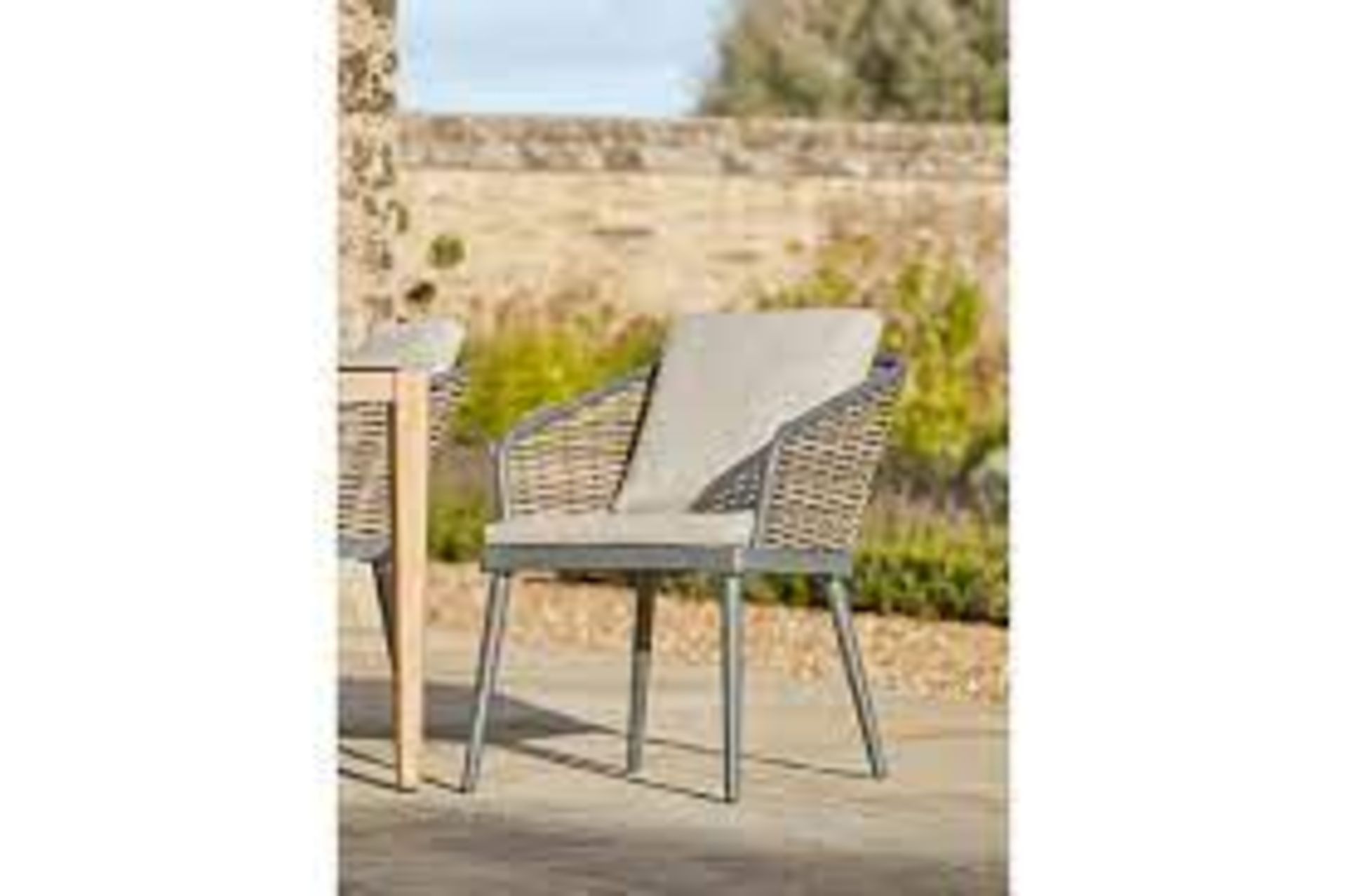 Cox & Cox Cabo Dining Chair. - SR3 RRP £405.00. A classic faux wicker woven back segues effortlessly