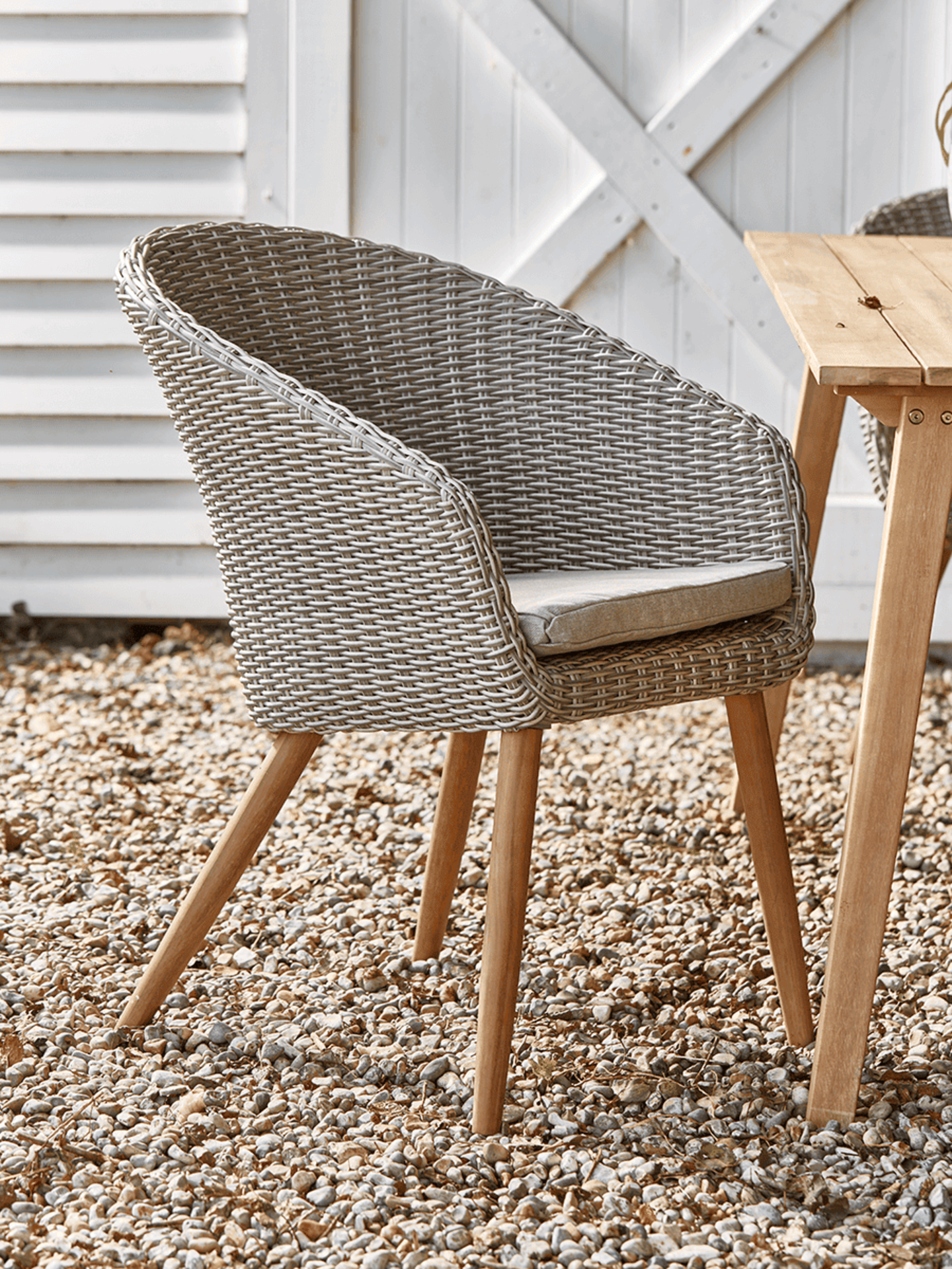 Cox & Cox Two Faux Rattan Dining Chairs. RRP £525.00. The sturdy woven faux wicker and durable