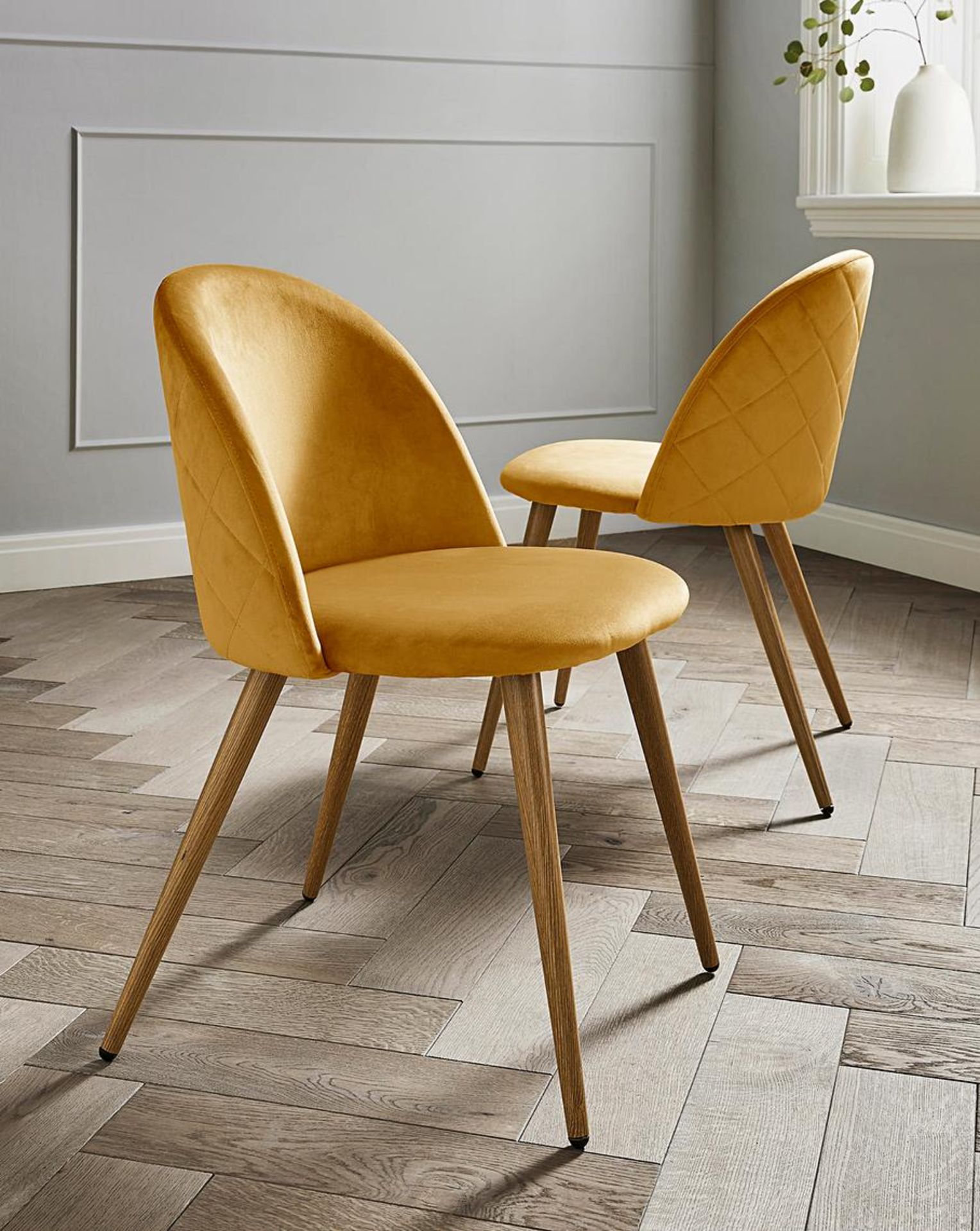 Pair of Klara Dining Chairs. RRP £209.00. The Klara Dining Chairs are the perfect style statement