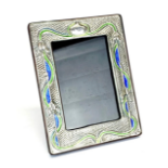 SOLID SILVER AND ENAMEL PHOTO FRAME . 7.5 X 5.5 INCHES, STERLING SILVER AND ENAMEL, CIRCA 1920