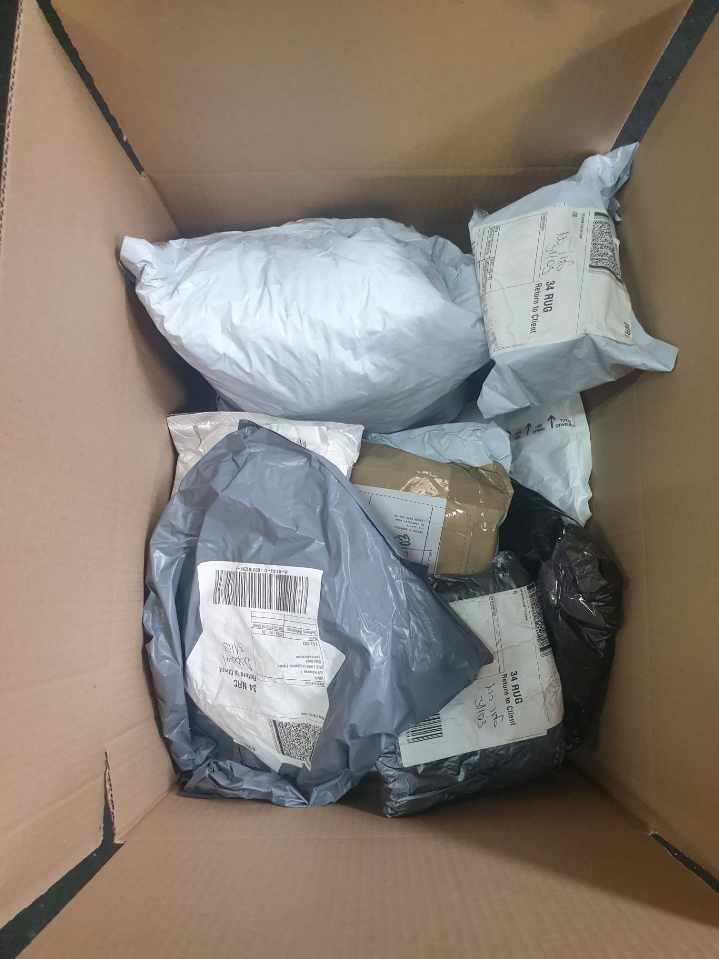 TRADE LOT TO CONTAIN 50 x UNCHECKED, UNOPENED, UNDELIVERED COURIER RETURNS. CONDITION & ITEMS - Image 2 of 3