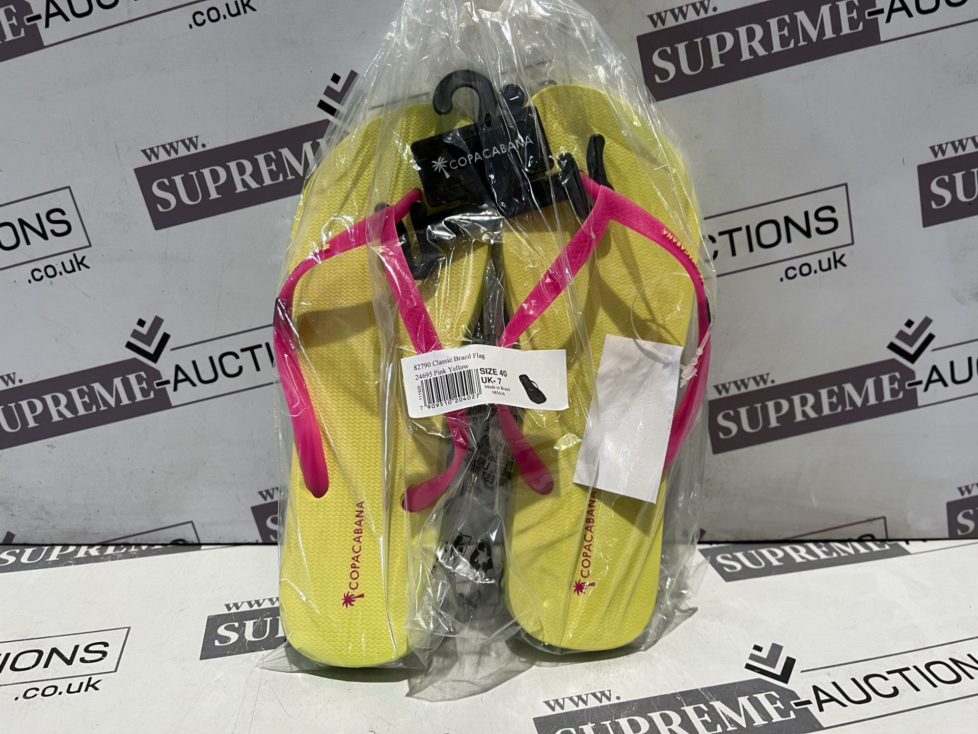 24 X BRAND NEW COPACABANA PINK AND YELLOW CLASSIC BRAZIL FLAG PREMIUM FLIP FLOPS IN RATIO SIZED