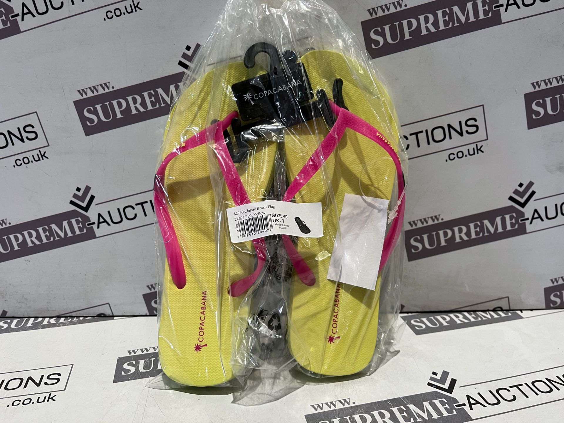 24 X BRAND NEW COPACABANA PINK AND YELLOW CLASSIC BRAZIL FLAG PREMIUM FLIP FLOPS IN RATIO SIZED