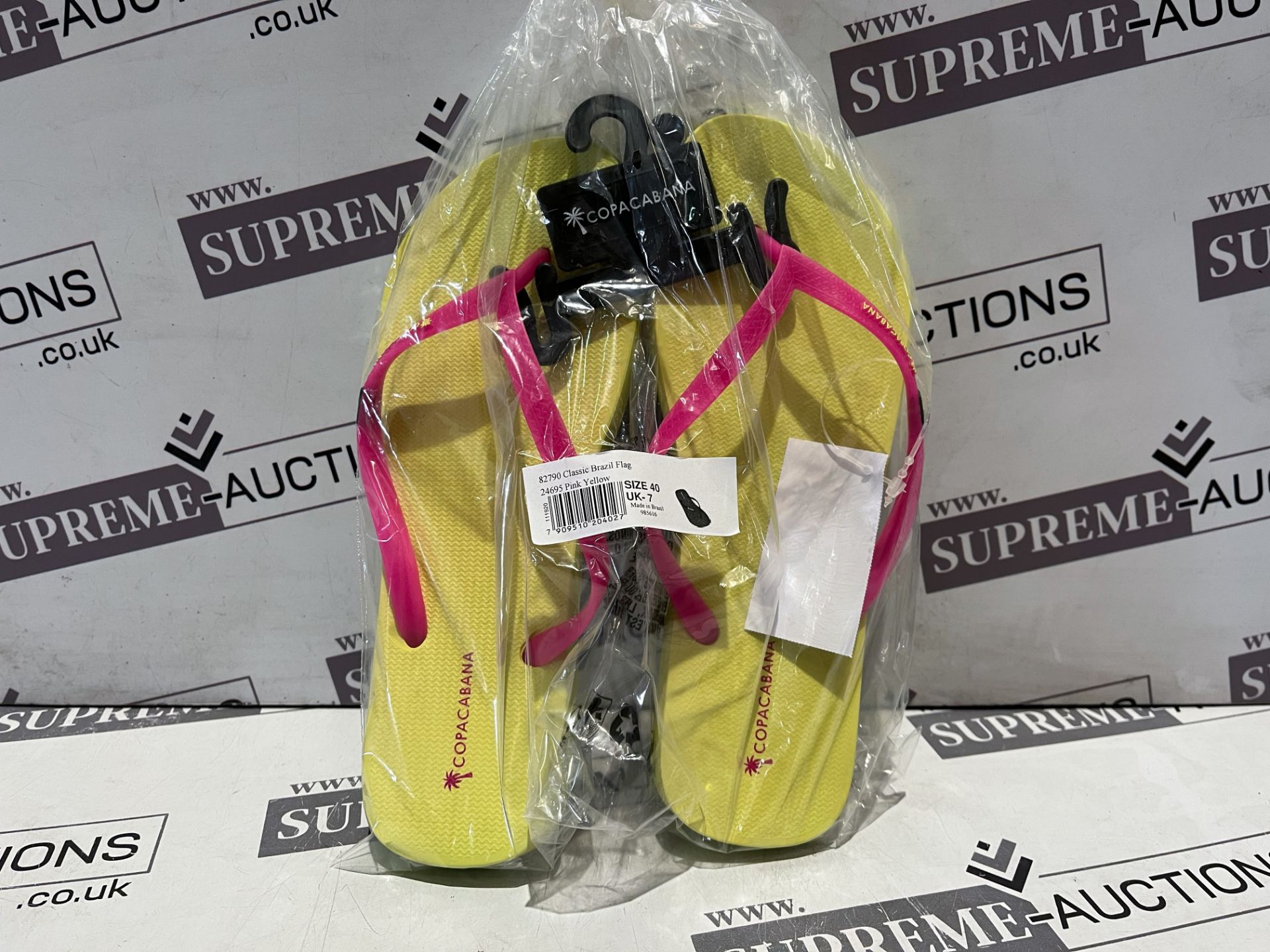 24 X BRAND NEW COPACABANA PINK AND YELLOW CLASSIC BRAZIL FLAG PREMIUM FLIP FLOPS IN RATIO SIZED