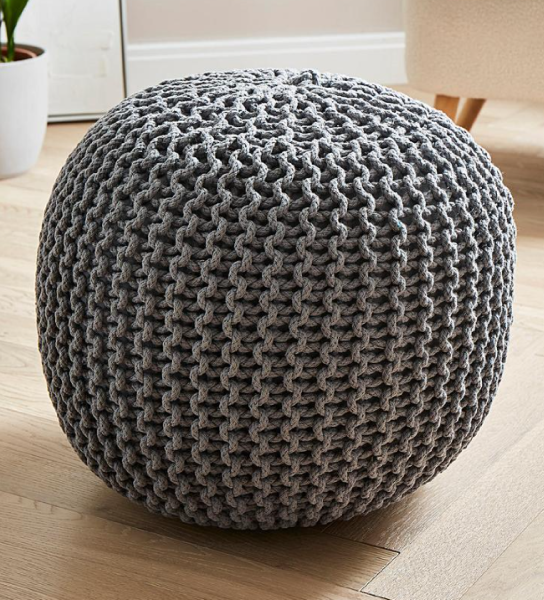 Knitted Pouffe. - SR5. This chic chunky knitted pouffe is a multipurpose accessory in your home. The