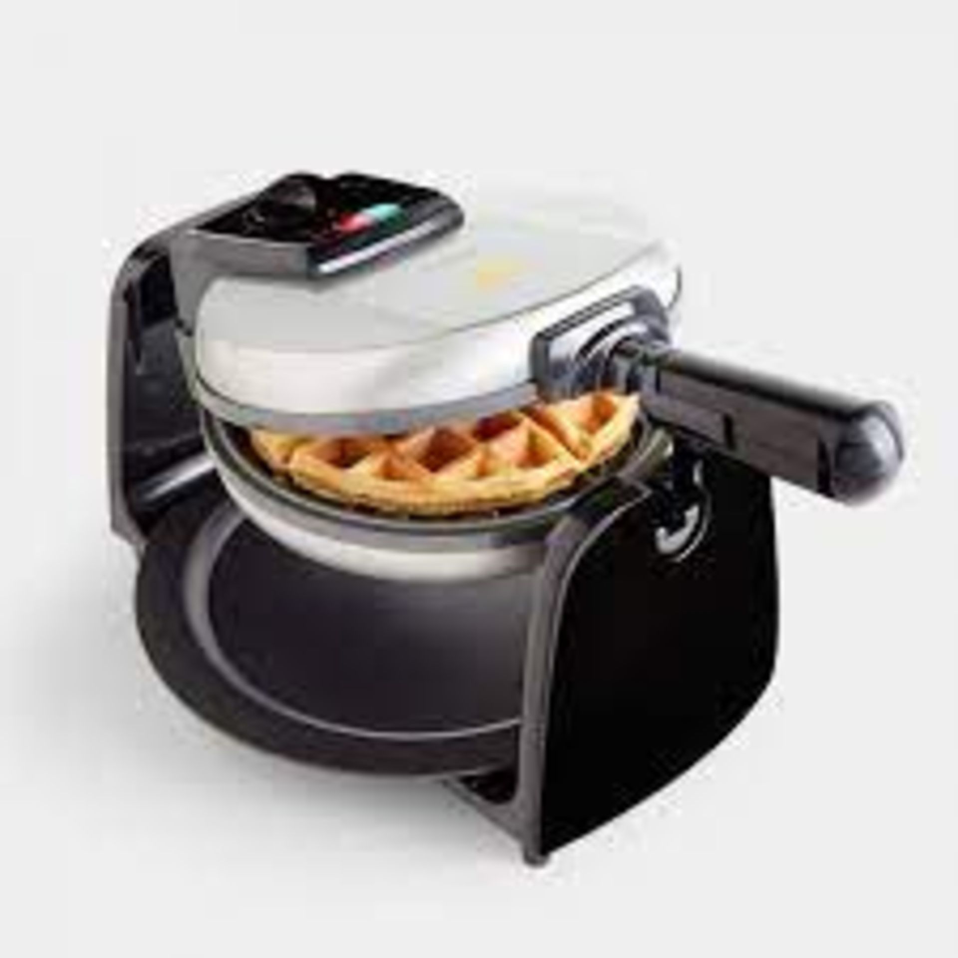 1000w Rotating Waffle Maker. - BI. This rotating waffle maker allows you to evenly spread the batter