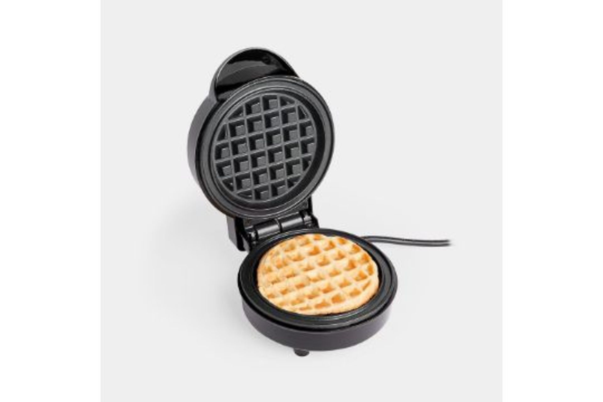 600w Mini Waffle Maker. - BI. With a max temperature of 155°C you can cook delicious waffles in an