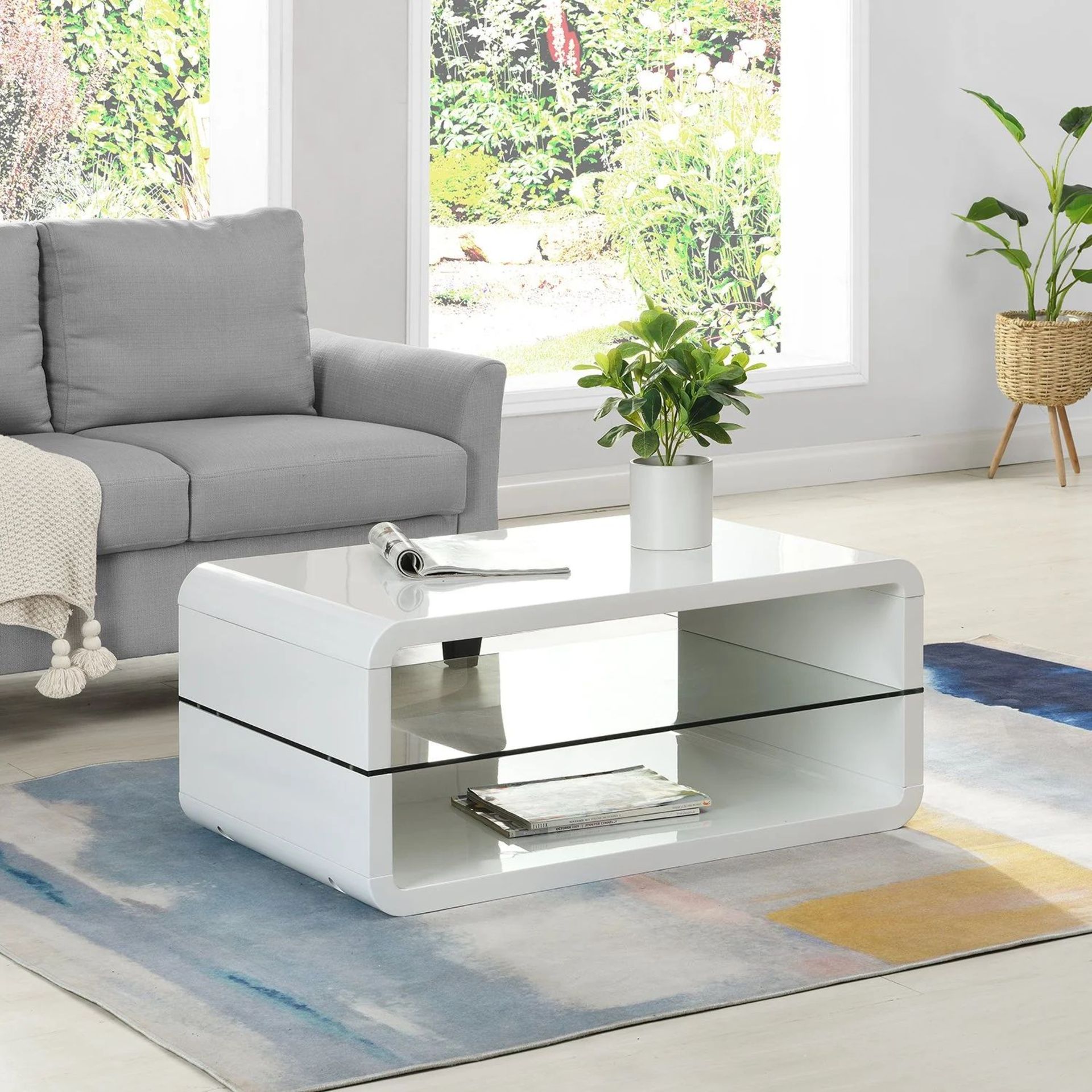 Lucent White High Gloss and Glass Shelf Coffee Table. - BI.8. RRP £199.99. Our Lucent coffee table