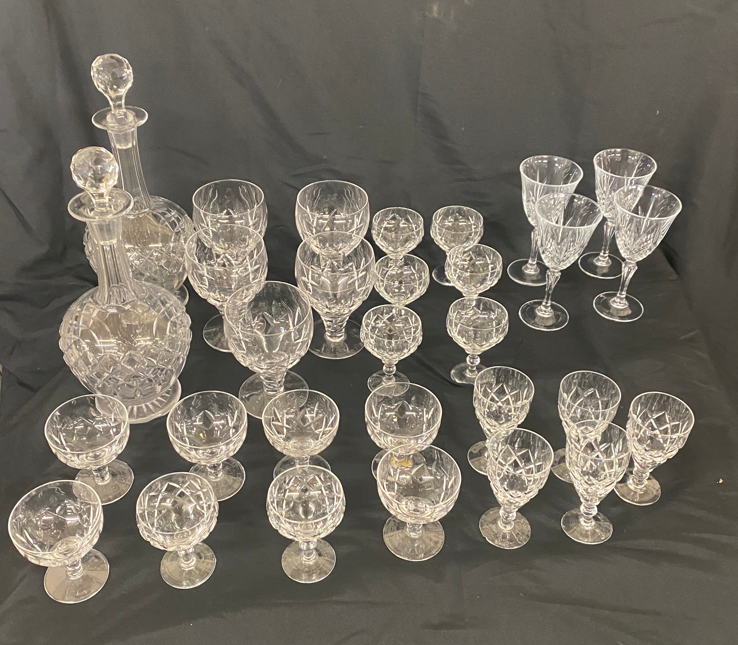 Large selection of vintage crystal glass includes decanters etc