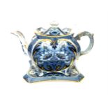 Decorative vintage teapot with stand, blue and gold decoration, approximate height with stand 7.5