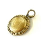 Georgian / Victorian yellow metal locket, approximate weight 6g, diameter 2.4cm