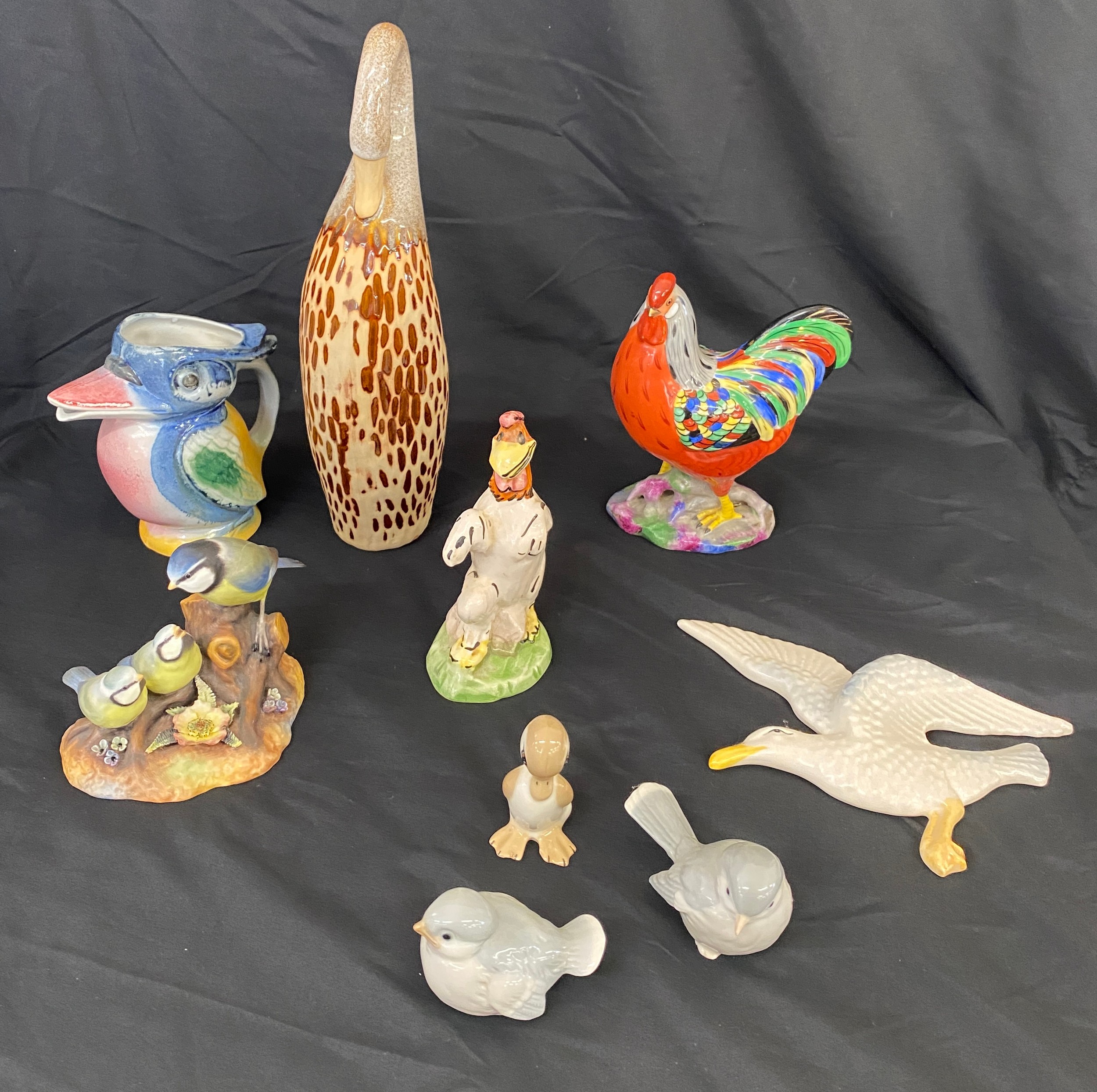 Selection of named bird pottery to include Royal crown derby blue tit and chicks, Sylvac seagul,