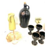 Large selection of assorted studio pottery includes Goblet, flagon, jug etc