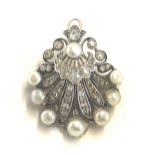 Antique natural pearl and diamond gold backed brooch/ pendant. Measures 4cm tall 3 cm wide.