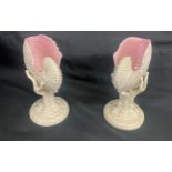 A pair of Royal Worcester nautilus. Rare impressed marks to base. Circa 1876