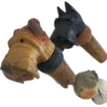 Three vintage novelty cork screws include Robin, Scottie Terriers and other