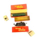 Two vintage boxed Tri-ang toys to include loco motive m7928 and a Tank loco black livery R59