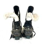 Vintage pair of Bauer roller skates approx size 5