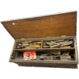 Vintage woodworkers tool chest with a large selection of wood working tools