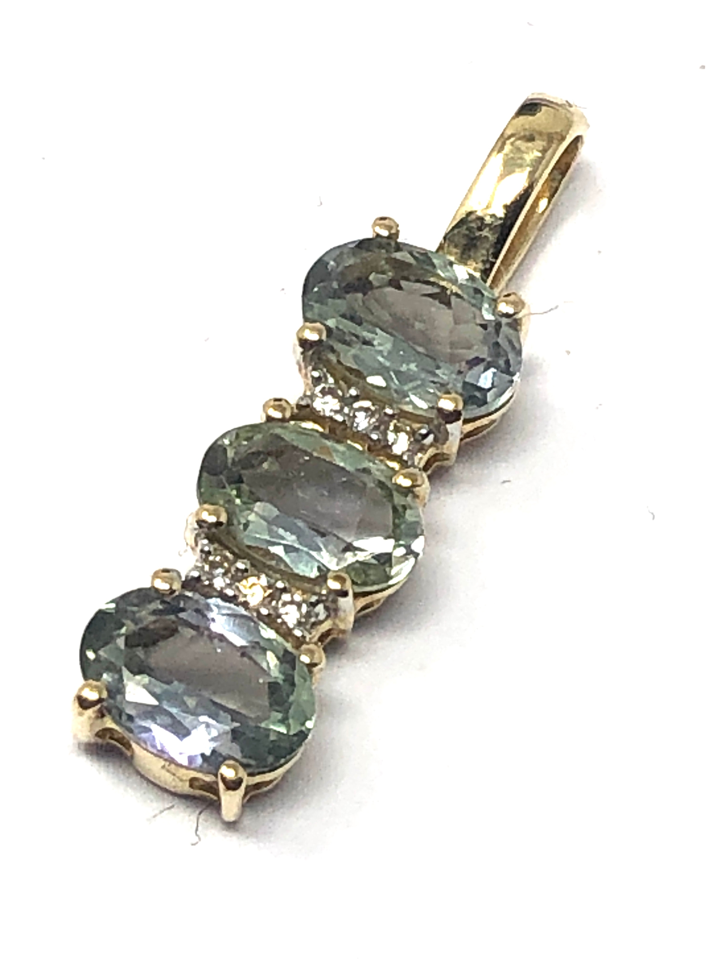 10ct gold gemstone set pendant measures approx 2.3 cm drop weight 1.5g